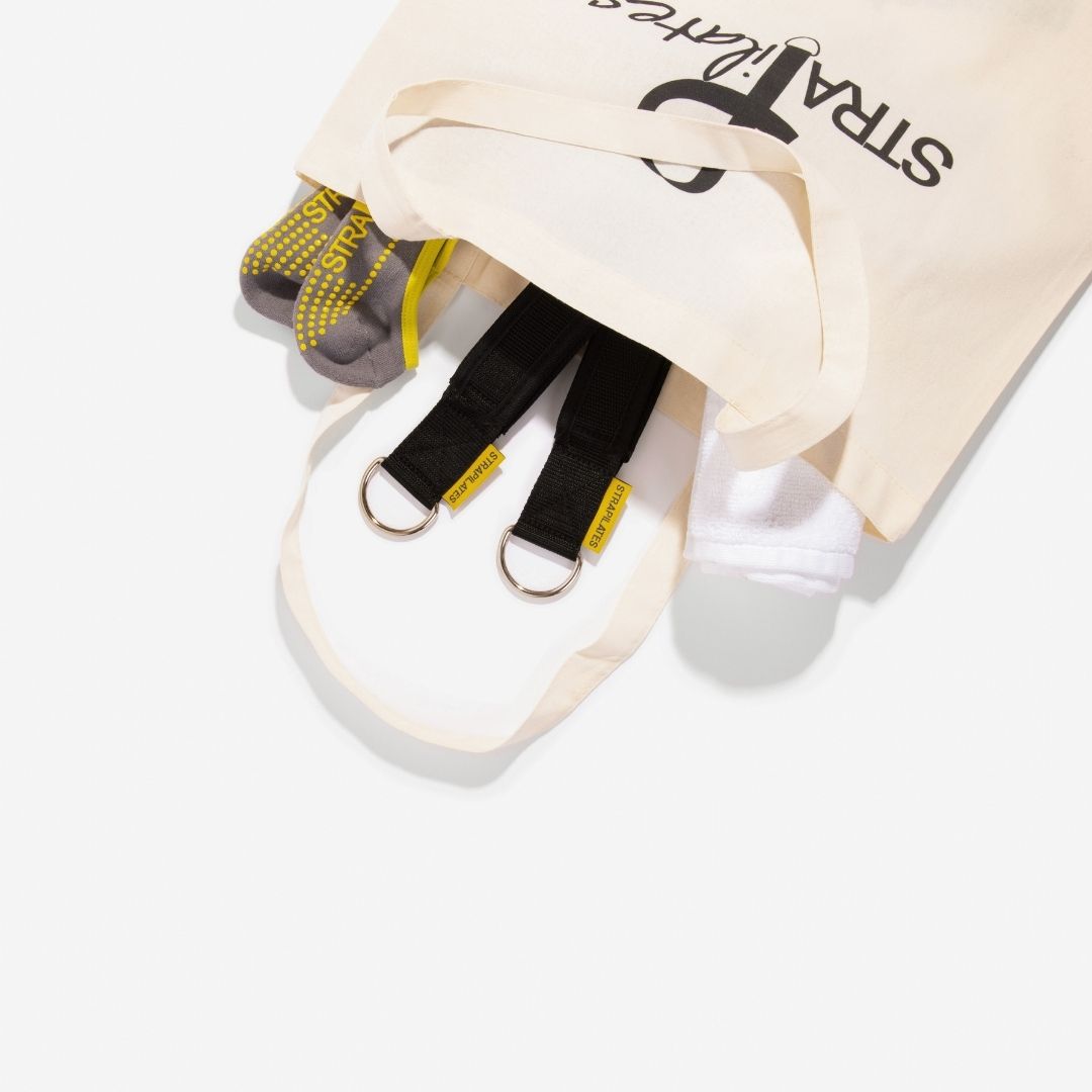 Your first pilates class bring sticky socks, pilates loops, and a towel