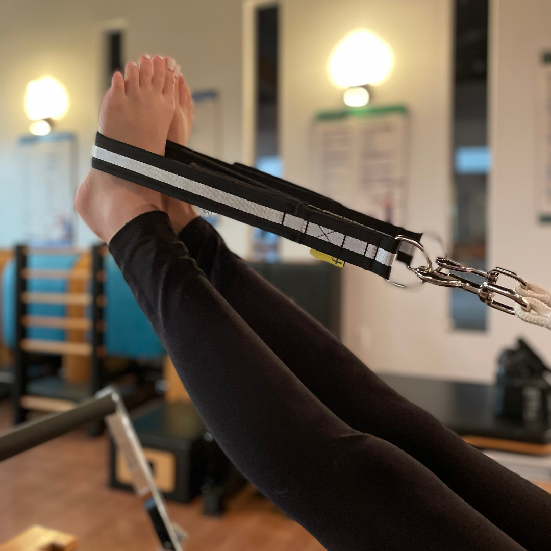 feet in straps with double loops