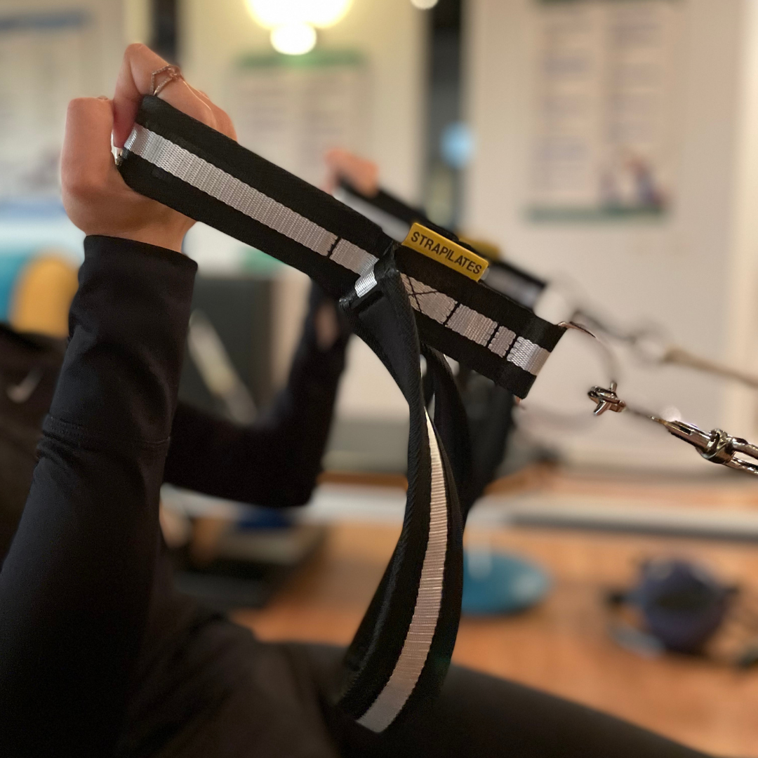 pilates artwork with straps